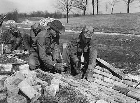 A Civilian Conservation Corps crew constructing a new road