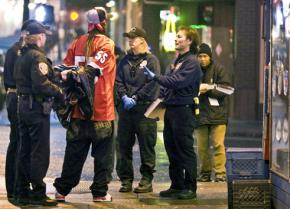 San Francisco police surround a woman being placed under arrest