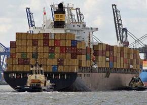 A container ship prepares to dock in New Jersey