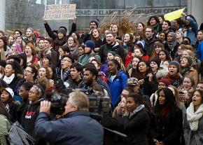 Students at Loyola University rally in solidarity with the Mizzou football team's strike against racism