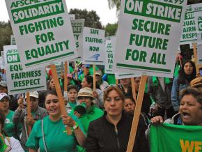 Striking workers at the University of California take to the streets of downtown Berkeley