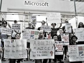Marchers protest Microsoft's contract with ICE outside the company's flagship store in New York City