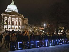 Rallying outside the Wisconsin state Capitol against Republican power grabs