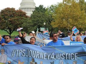 Immigrant rights activists march in defense of TPS recipients in Washington
